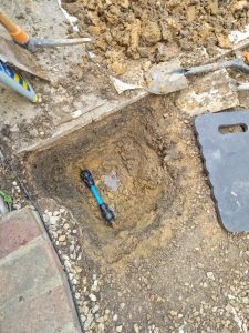 A picture of an exposed leaking undergroud water pipe which was detected by one of Metro Plumb's expert leak detection specialists.